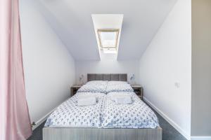 Postel nebo postele na pokoji v ubytování Pokoje Iga