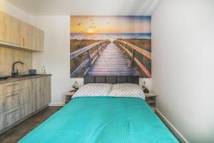 Postel nebo postele na pokoji v ubytování Pokoje Iga
