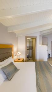 Ένα ή περισσότερα κρεβάτια σε δωμάτιο στο Villa Stefanos