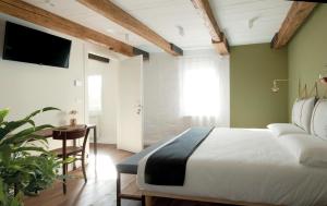 Posteľ alebo postele v izbe v ubytovaní Agriturismo Basegò