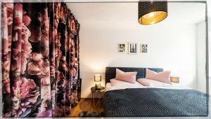 Postel nebo postele na pokoji v ubytování Ferienwohnung Seeblick Grundlsee