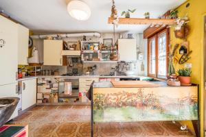 Kuchyň nebo kuchyňský kout v ubytování Selvatica50 b&b