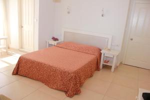 Postel nebo postele na pokoji v ubytování Hotel Vanilla