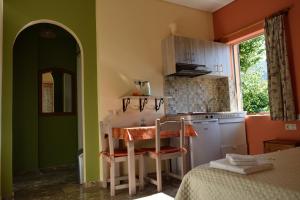 A kitchen or kitchenette at Stamoulis Apartments