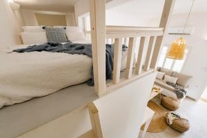 Postel nebo postele na pokoji v ubytování Menori Luxury Suite
