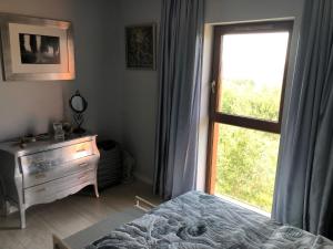 Postel nebo postele na pokoji v ubytování APARTAMENT DRUGIE PIĘTRO