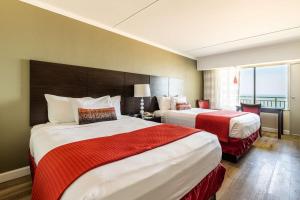 Sandcastle Resort客房内的一张或多张床位