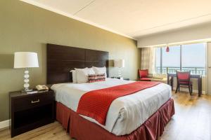 Sandcastle Resort客房内的一张或多张床位