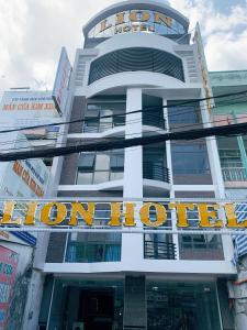 a building with a lion hotel sign on it at LION HOTEL in Can Tho