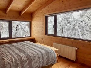 A bed or beds in a room at Chalet Ciprés