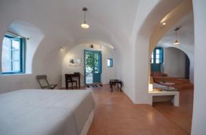 Santorinio Yellow House 객실 침대