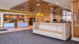 The lobby or reception area at Holiday Inn Express & Suites - Parkersburg East, an IHG Hotel