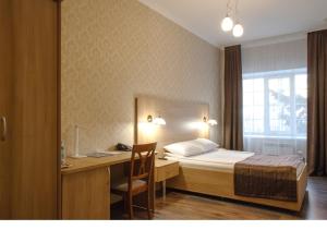 Ένα ή περισσότερα κρεβάτια σε δωμάτιο στο Hotel Persona