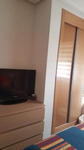 Łóżko lub łóżka w pokoju w obiekcie Marina d'Or, apartamentos Valparaíso