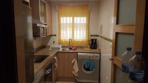 Kuchnia lub aneks kuchenny w obiekcie Marina d'Or, apartamentos Valparaíso