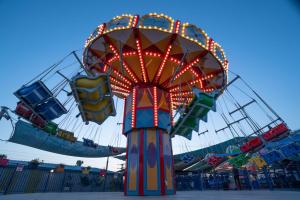 a ferris wheel at a carnival in a park at Tzuba Hotel in Ẕova +55 photos