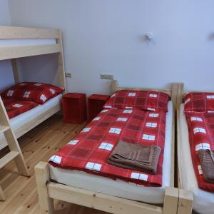 Posteľ alebo postele v izbe v ubytovaní Apartmán Špacír