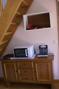 
A television and/or entertainment center at Nowe Grochale 12 B
