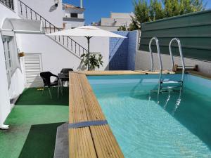 
The swimming pool at or near Casa Portuguesa

