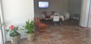 A television and/or entertainment centre at Pansion Marousa