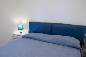 Postel nebo postele na pokoji v ubytování Villa Azzurra a pochi passi dal mare