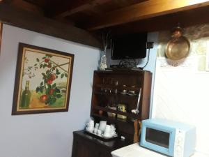 Kuchyň nebo kuchyňský kout v ubytování La Casina de Abo + 33 fotografií