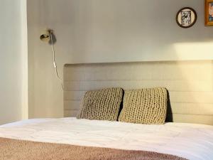 Postel nebo postele na pokoji v ubytování Villa ManJana am Wurmberg