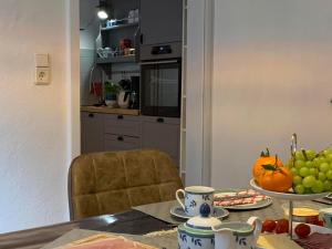 Kuchyň nebo kuchyňský kout v ubytování Villa ManJana am Wurmberg
