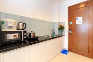 Nhà bếp/bếp nhỏ tại Homestay saigon Airport