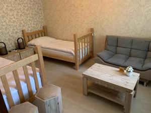 Postel nebo postele na pokoji v ubytování Hotel SHIBI