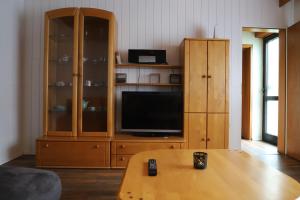 TV a/nebo společenská místnost v ubytování Ferienhaus Irene