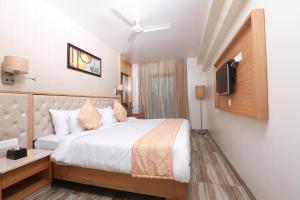 Postel nebo postele na pokoji v ubytování Hotel Cliffton
