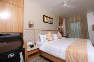 Postel nebo postele na pokoji v ubytování Hotel Cliffton