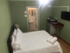 Un ou plusieurs lits dans un hébergement de l'établissement Ankuweni Guest house
