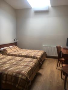 Posteľ alebo postele v izbe v ubytovaní Pokoje Amore Residence