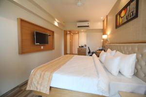 TV a/nebo společenská místnost v ubytování Hotel Cliffton