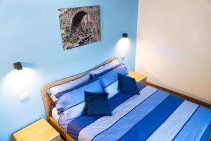 Postel nebo postele na pokoji v ubytování B&B Da Pieri