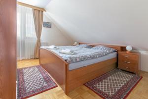 Postel nebo postele na pokoji v ubytování Apartment Jakovc
