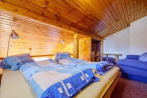 Postel nebo postele na pokoji v ubytování Apartmány Tereza