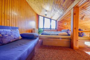 Postel nebo postele na pokoji v ubytování Apartmány Tereza + 15 fotografií