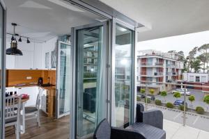 Balkón nebo terasa v ubytování Resort Apartamenty Klifowa Rewal 36