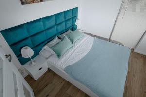 Postel nebo postele na pokoji v ubytování Resort Apartamenty Klifowa Rewal 36