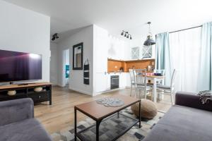 Kuchyň nebo kuchyňský kout v ubytování Resort Apartamenty Klifowa Rewal 36