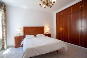 Posteľ alebo postele v izbe v ubytovaní Sanlucar Misericordia Centro