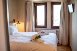 A bed or beds in a room at To Stefani tis Makrinas