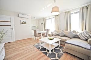 Posedenie v ubytovaní Victoria Residence Apartments by Grand Apartments