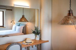 A bed or beds in a room at To Stefani tis Makrinas