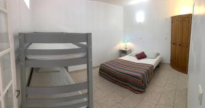 Postel nebo postele na pokoji v ubytování Le Mas des 3 Anes