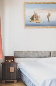 Postel nebo postele na pokoji v ubytování Cybulskiego Guest Rooms