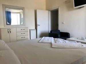 Postel nebo postele na pokoji v ubytování Hotel Autostrada (Highway)